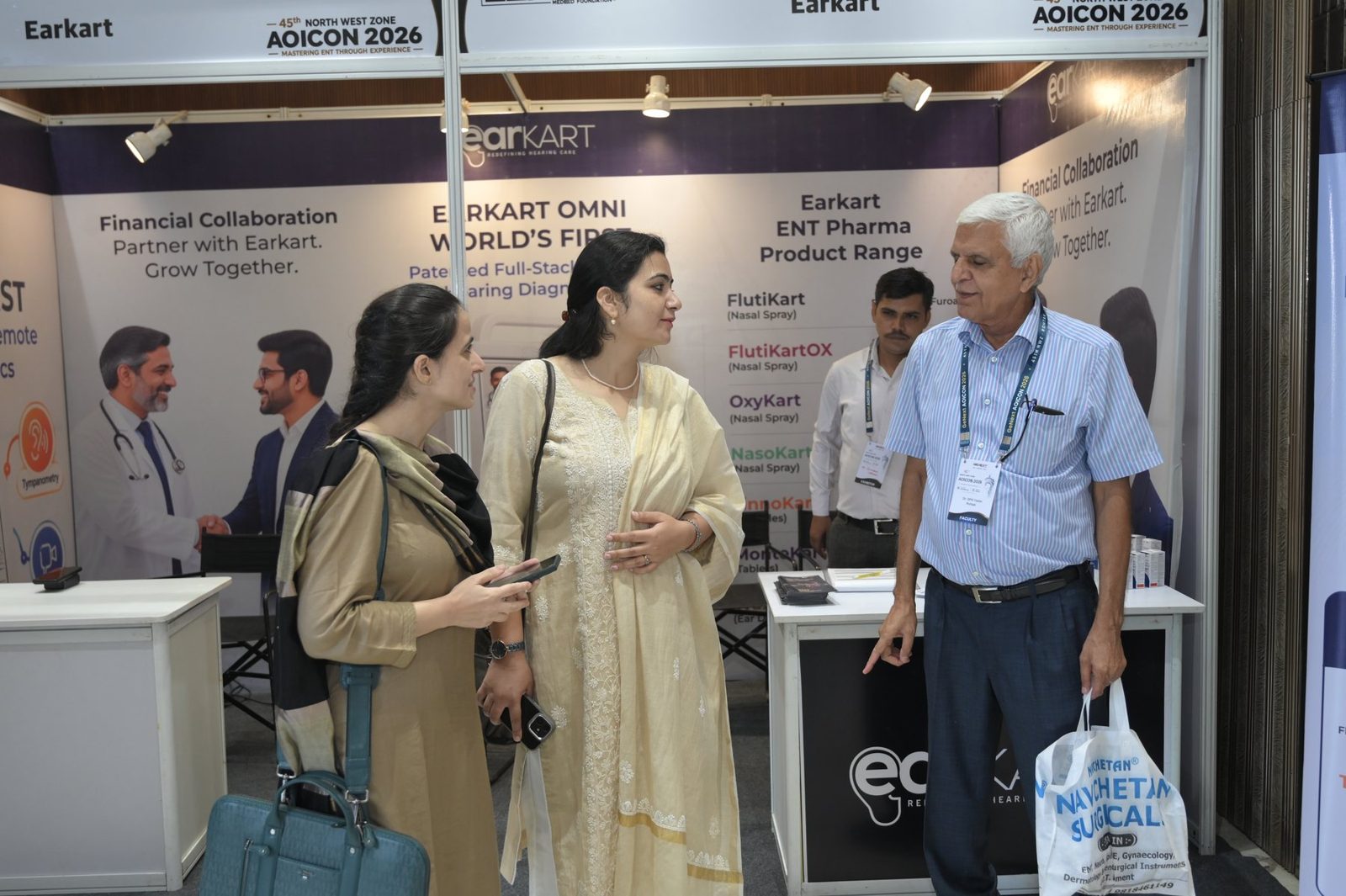 Delegates and faculty at the stall