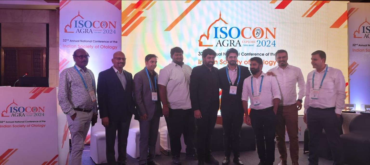Group photograph in front of the ISOCON Agra 2024 conference backdrop